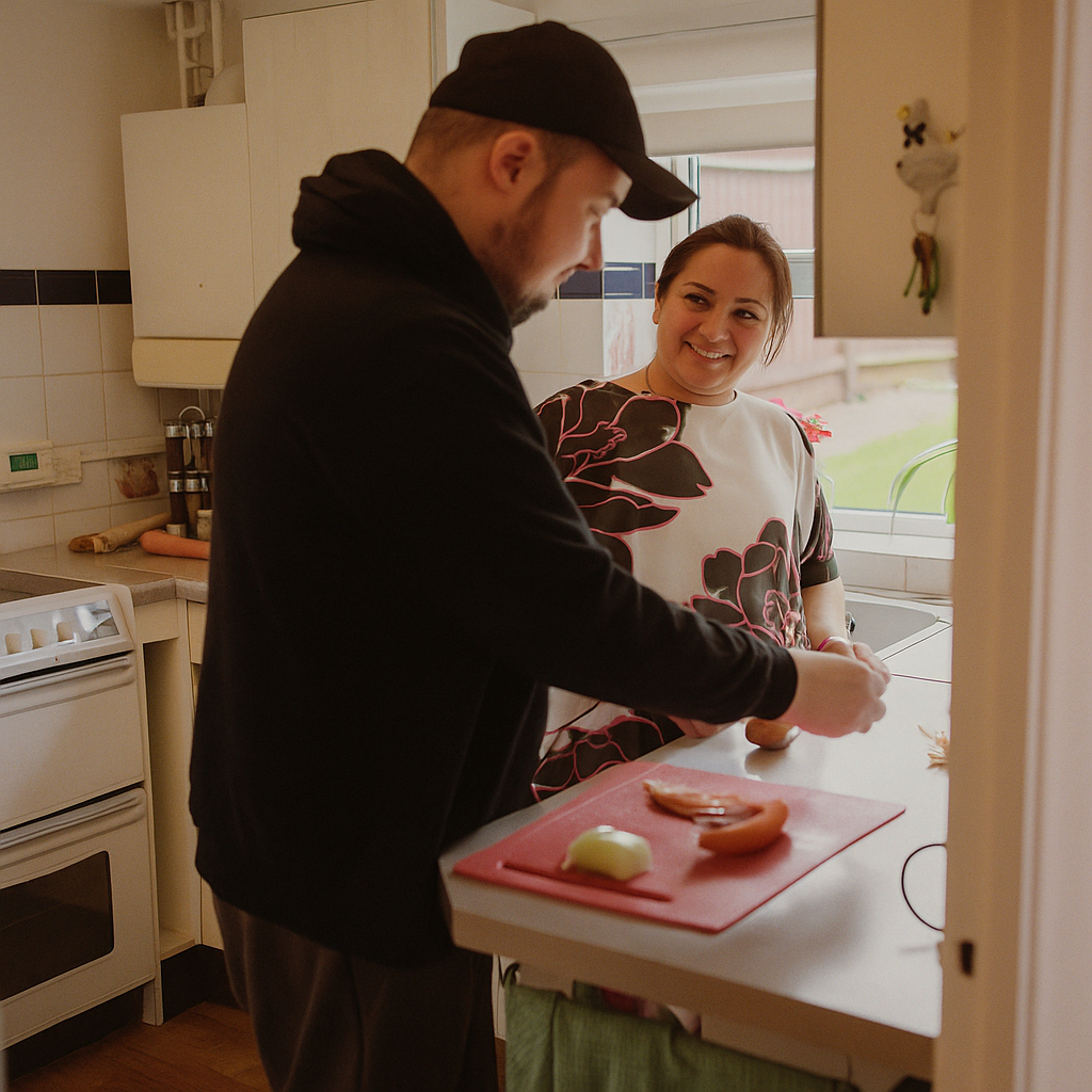 Carer laughing with a care resident